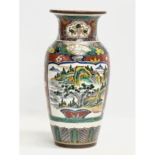 347 - A large Japanese Ko Kutani hand painted vase. 19x36cm