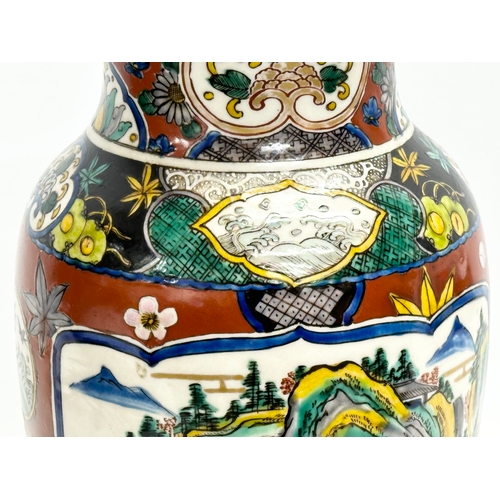 347 - A large Japanese Ko Kutani hand painted vase. 19x36cm