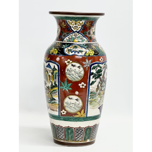 347 - A large Japanese Ko Kutani hand painted vase. 19x36cm