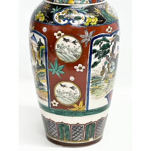 347 - A large Japanese Ko Kutani hand painted vase. 19x36cm