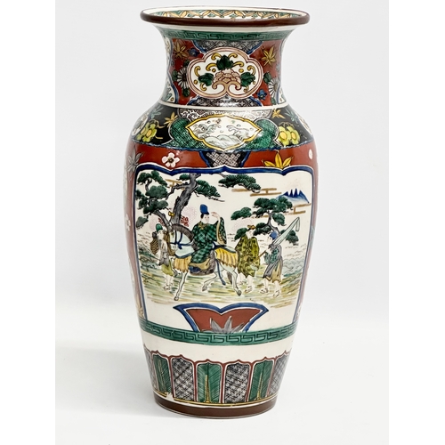 347 - A large Japanese Ko Kutani hand painted vase. 19x36cm