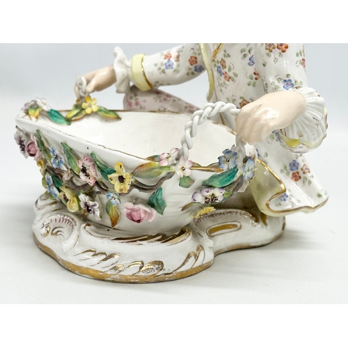 344 - John Bevington. A large Late 19th Century hand painted pottery figurine sweetmeat basket by John Bev... 