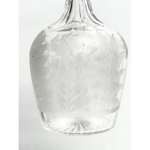 349 - A fine quality Early 20th Century etched glass decanter. 25cm.