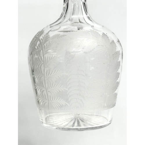 349 - A fine quality Early 20th Century etched glass decanter. 25cm.