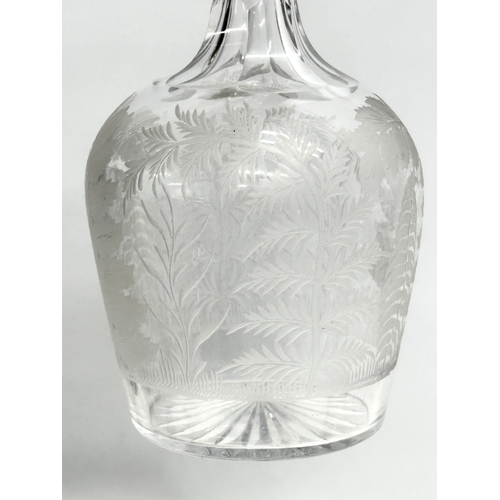 349 - A fine quality Early 20th Century etched glass decanter. 25cm.