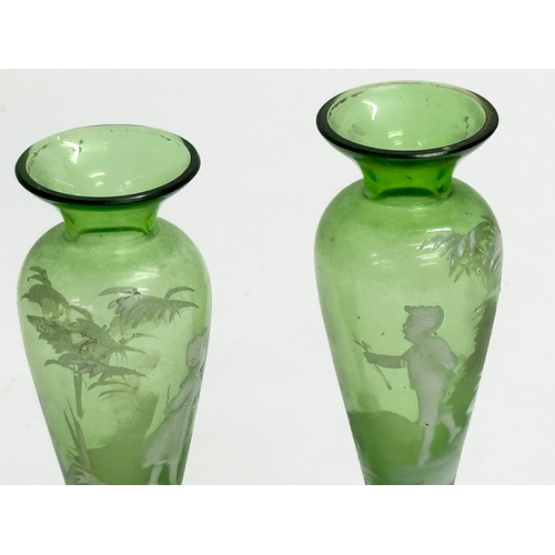 357 - A pair of small Late 19th Century Victorian Mary Gregory glass vases. 5.5x14cm.