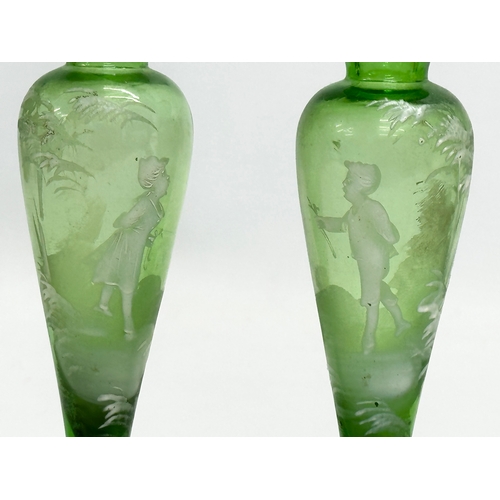 357 - A pair of small Late 19th Century Victorian Mary Gregory glass vases. 5.5x14cm.