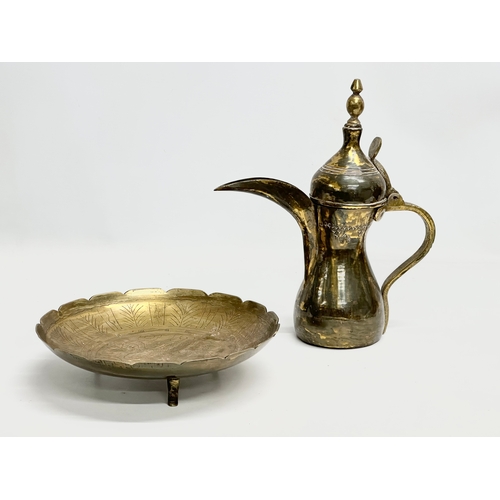 359 - A Late 19th Century Saudi Arabian brass dallah pot, together with an Early 20th Century Chinese bras... 