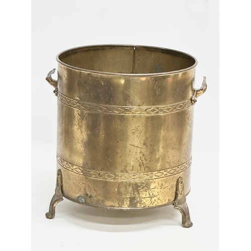 353 - A vintage brass coal bucket. 35x34cm