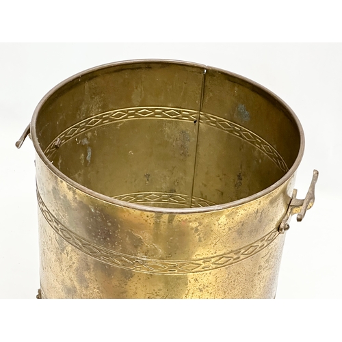 353 - A vintage brass coal bucket. 35x34cm