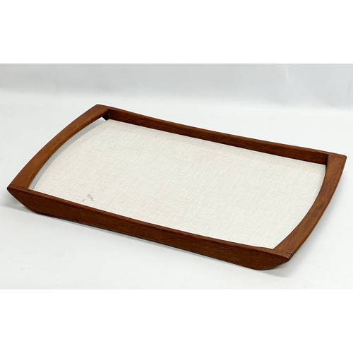 365 - A Mid Century teak serving tray. 58x35cm