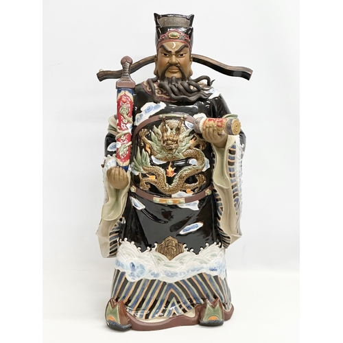 356 - Shiwan. A large Chinese Bao Zheng statue by Shiwan. Impressed mark. Late 20th Century. 28x61cm.