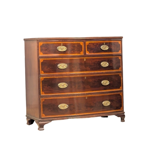 807 - A George III inlaid mahogany oak lined bow front chest of drawers. Circa 1800. 105x52x98cm (3)