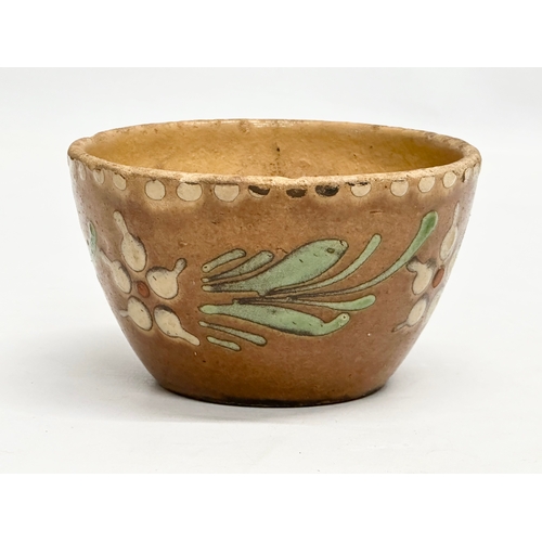 311 - A small Early 20th Century glazed stoneware bowl in the manner of Auguste Delaherche. 11.5x6.5cm.