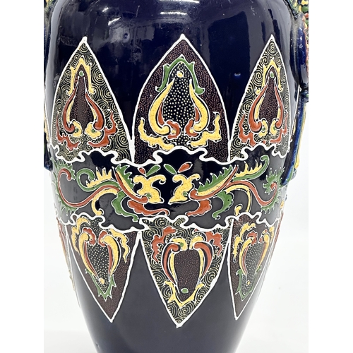 312 - An Early 20th Century Japanese Moriage vase. Late Meiji Period (1868-1912) circa 1900. 15x28cm.