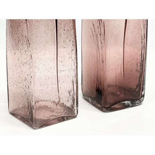 381 - A pair of large 20th Century blown glass vases. 10x10x30cm.