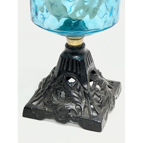 255 - A Late 19th Century Victorian oil lamp with blue glass bowl. 29cm