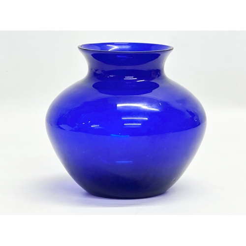 394 - A 1950’s cobalt blue glass vase. 15x14.5cm.