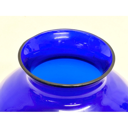 394 - A 1950’s cobalt blue glass vase. 15x14.5cm.