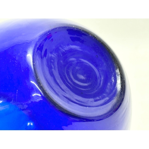 394 - A 1950’s cobalt blue glass vase. 15x14.5cm.