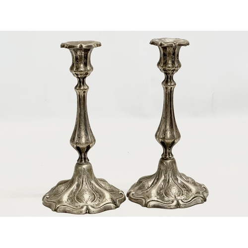 395 - A pair of Early 20th Century Cambridge Silver Plate candlesticks. W&Co. Circa 1910. 13.5x26cm