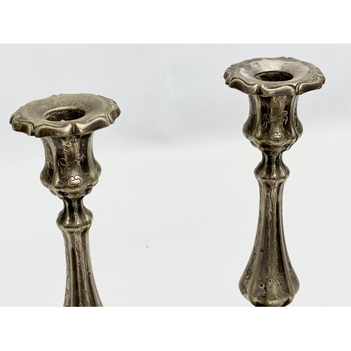 395 - A pair of Early 20th Century Cambridge Silver Plate candlesticks. W&Co. Circa 1910. 13.5x26cm