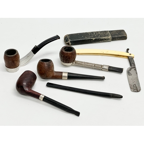 424 - A collection of smokers pipes. 1 silver mounted.