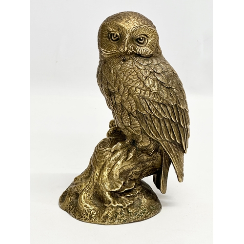 397 - An Early 20th Century heavy brass owl. 20cm