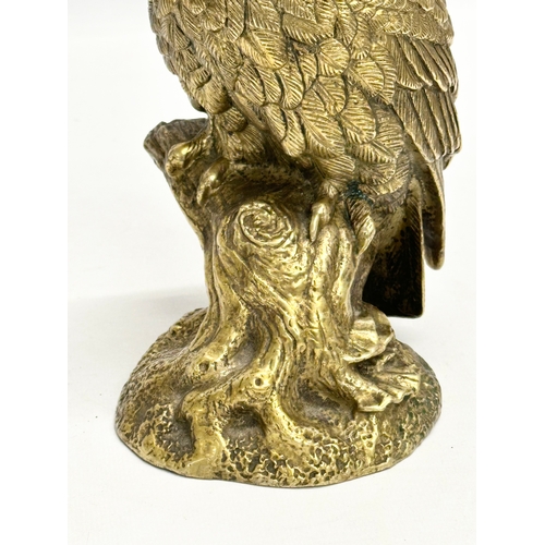 397 - An Early 20th Century heavy brass owl. 20cm