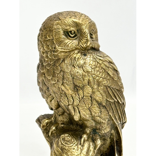 397 - An Early 20th Century heavy brass owl. 20cm