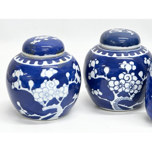 246E - A collection of Mid/Late 20th Century Chinese blue and white prunus pattern pottery. A pair of prunu... 