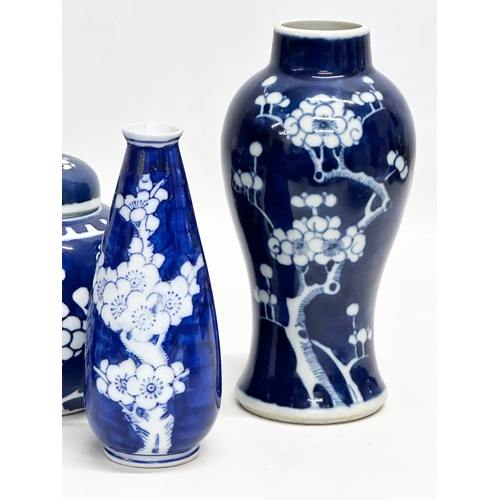 246E - A collection of Mid/Late 20th Century Chinese blue and white prunus pattern pottery. A pair of prunu... 