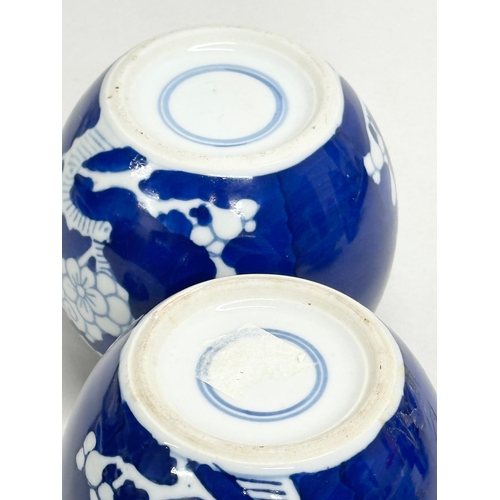 246E - A collection of Mid/Late 20th Century Chinese blue and white prunus pattern pottery. A pair of prunu... 