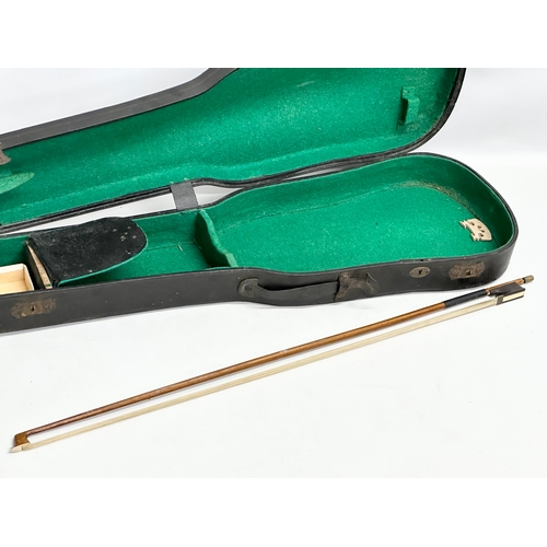 423 - An Early 20th Century violin in case. Wolff Bros.