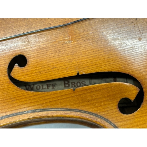 423 - An Early 20th Century violin in case. Wolff Bros.