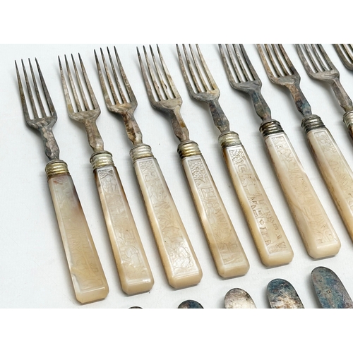 370C - An Early 20th Century silver plated cutlery set with Chinese style mother of pearl handles.