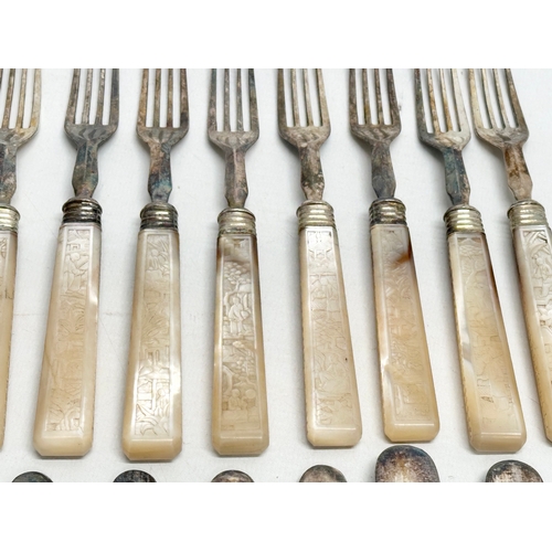 370C - An Early 20th Century silver plated cutlery set with Chinese style mother of pearl handles.