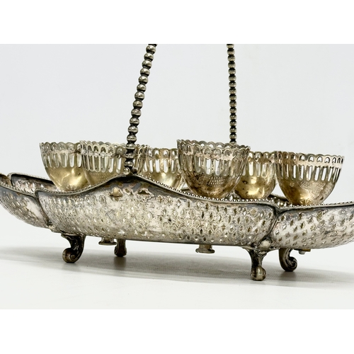 246G - An Early 20th Century silver plated egg cup cruet set/breakfast set. 1918-1923. Tray 29x20cm.