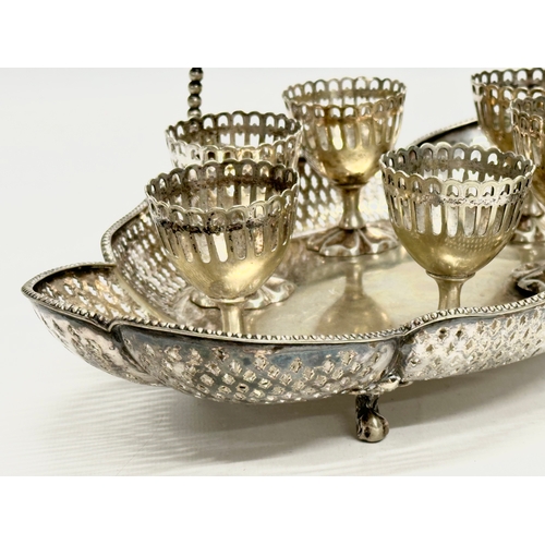 246G - An Early 20th Century silver plated egg cup cruet set/breakfast set. 1918-1923. Tray 29x20cm.