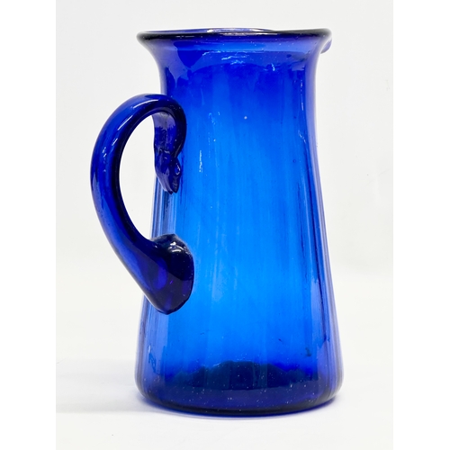 246H - A Late 19th Century Bristol Blue water jug. 16x13x22cm