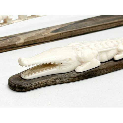 246P - 2 pieces of Early 20th Century bone. 38cm. 26cm.