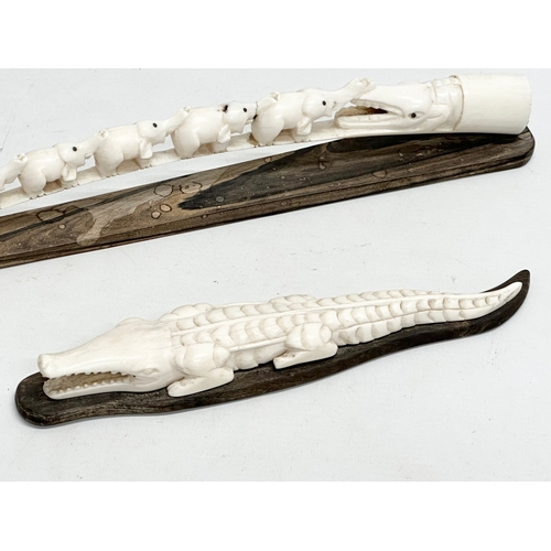 246P - 2 pieces of Early 20th Century bone. 38cm. 26cm.