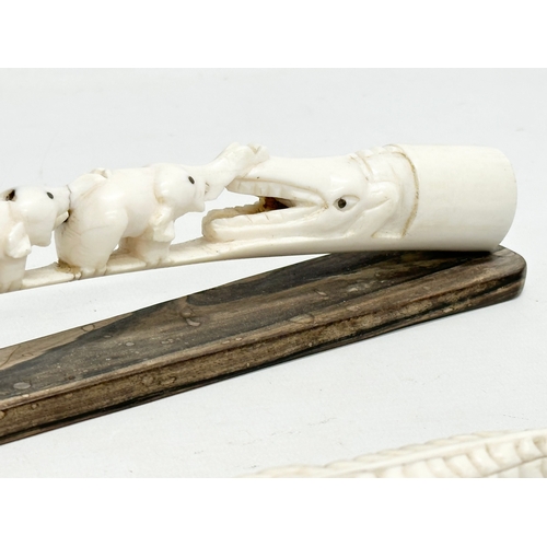 246P - 2 pieces of Early 20th Century bone. 38cm. 26cm.