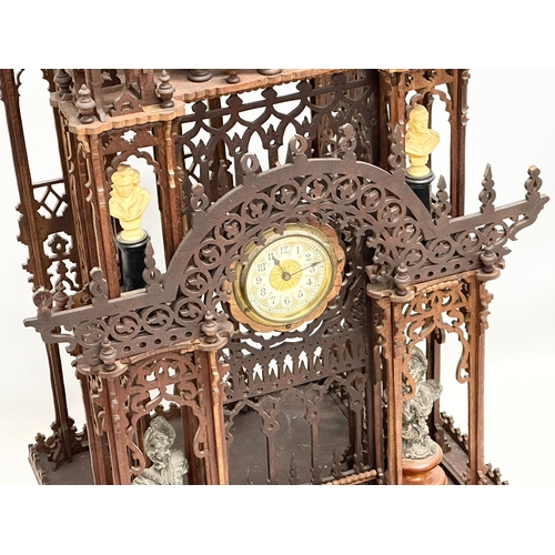 804 - A late Late 19th Century Cathedral Clock in showcase. The British United Clock Company. Circa 1880s.... 