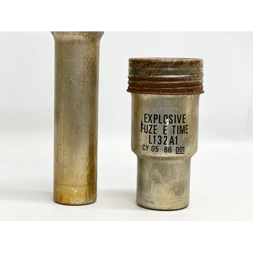 423B - 2 WWI fuse pots. 35cm. 17cm.