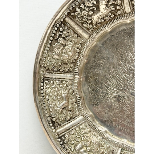 10 - A large 19th Century Indian silver bowl. 29x4cm. 532 grams.