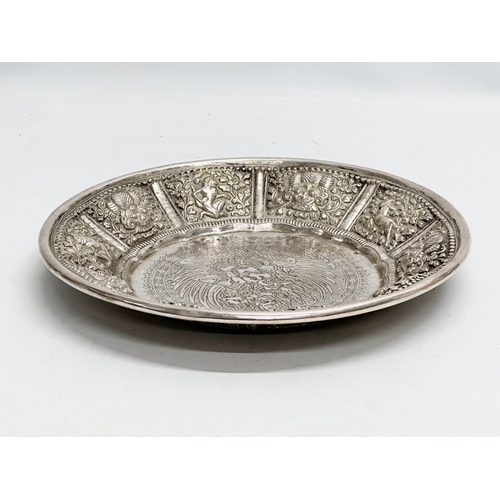 10 - A large 19th Century Indian silver bowl. 29x4cm. 532 grams.