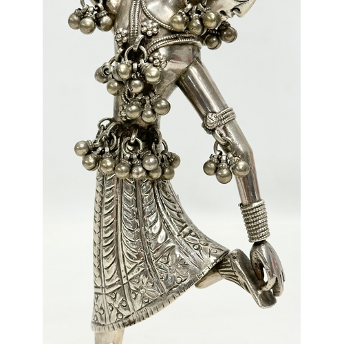 10A - A Late 19th/Early 20th Century Indian silver figure. 23.5cm. 310 grams.