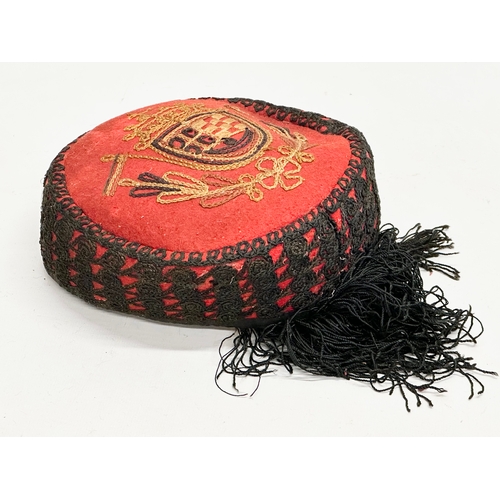 430B - An Early 20th Century Croatian embroidered cap.