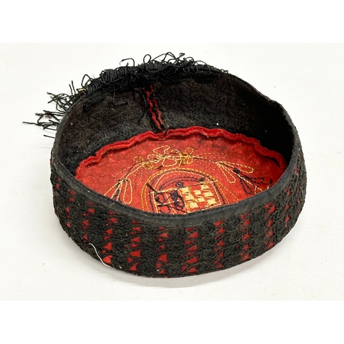 430B - An Early 20th Century Croatian embroidered cap.